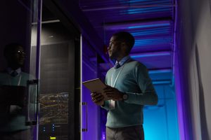 african-american-it-specialist-in-server-room-e1696860906131.jpg